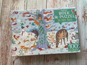 Boek & puzzel in het bos