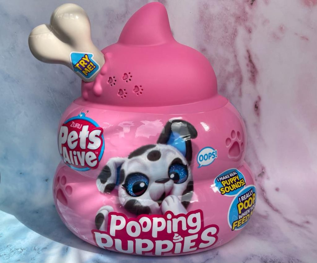 verpakking Pooping Puppies zijn schattige hondjes, die botjes eten en deze ook weer uitpoepen. En ook winnaar van de Speelgoed van het Jaar verkiezing!