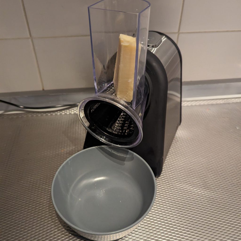 Raspen van de Parmigiano