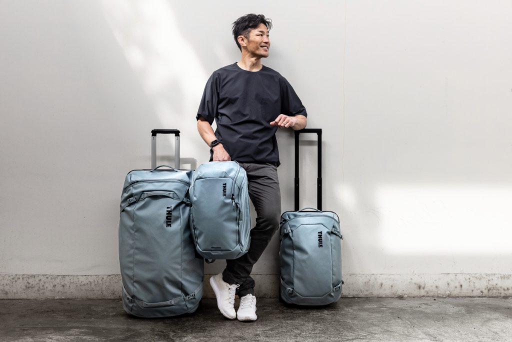 koffers en rugzak met meneer