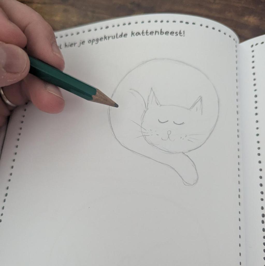 doedelen voor kattenmensen, teken een opgekruld kattenbeest