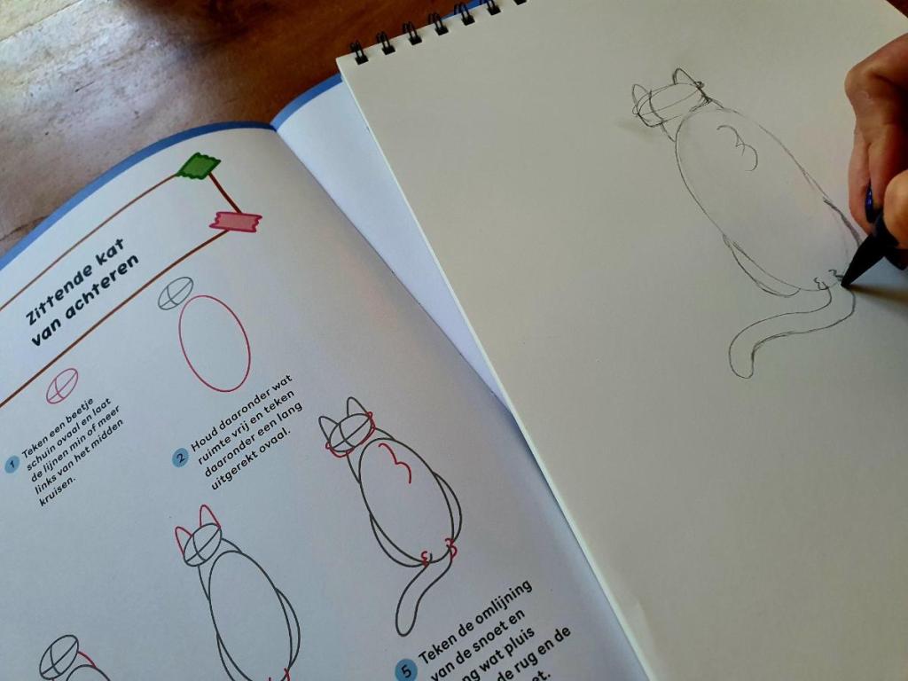Schattige katten en kittens tekenen